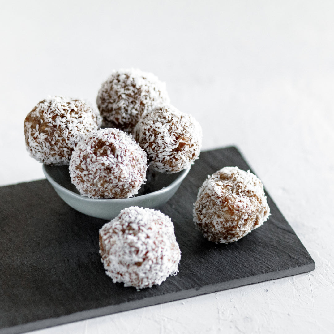 Almond and Date Truffles Rolled in Coconut